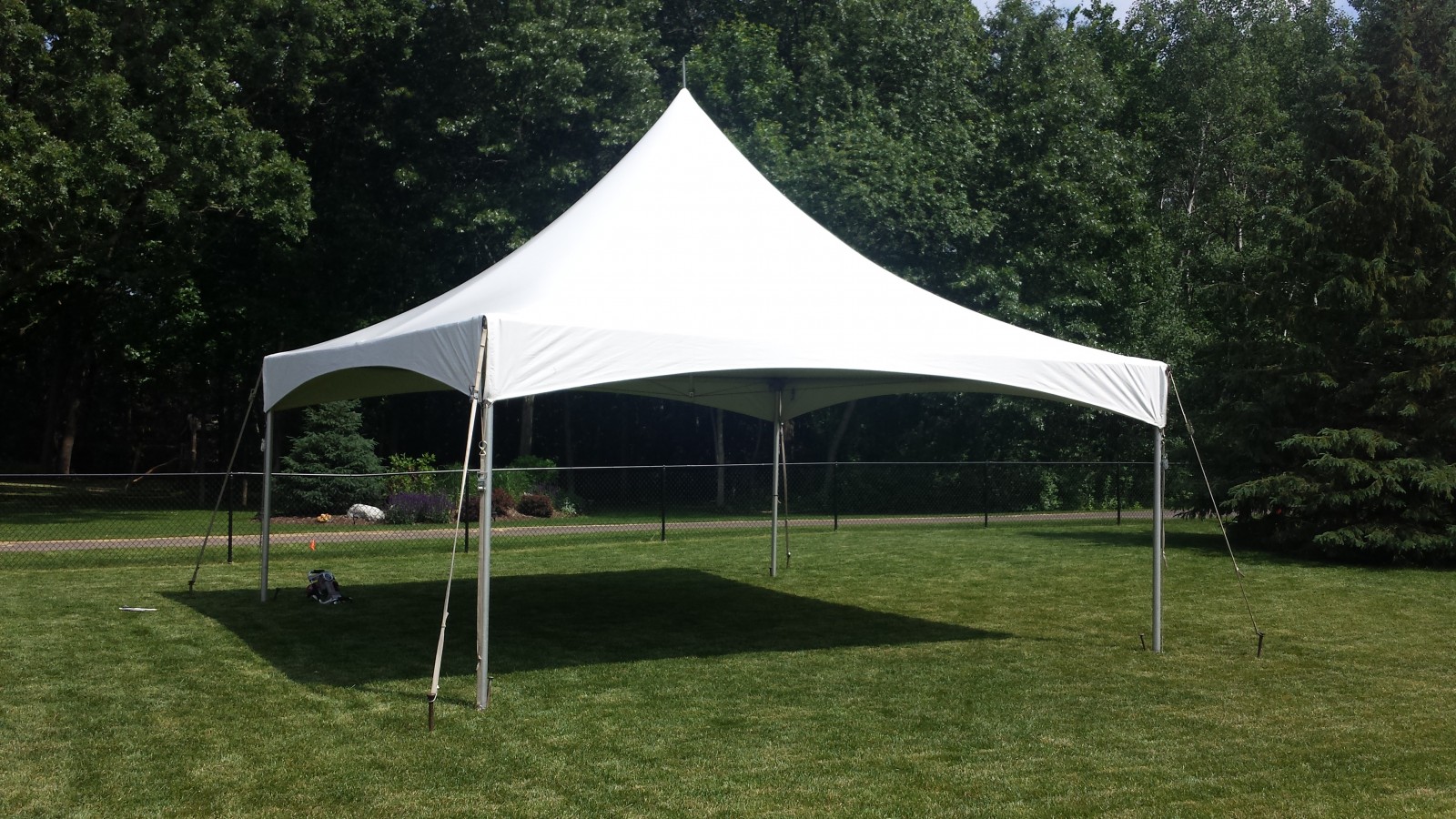 20' x 20' high peak tent rental for backyard graduation parties in Minnesota